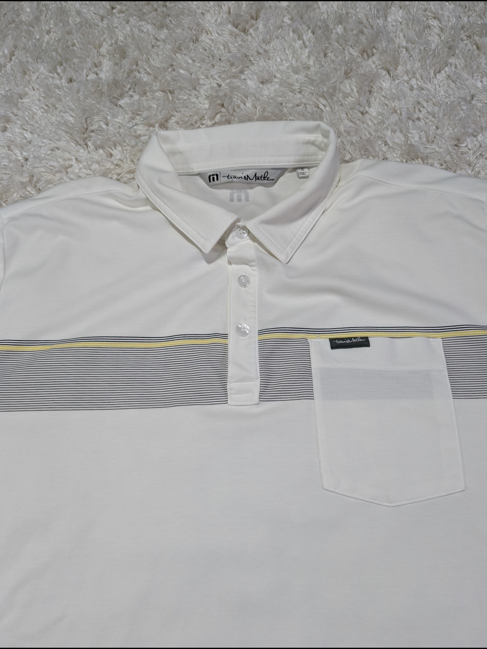 Travis Mathew White Polo with Gray Stripe and Yellow Trim